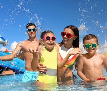 family having fun in a pool